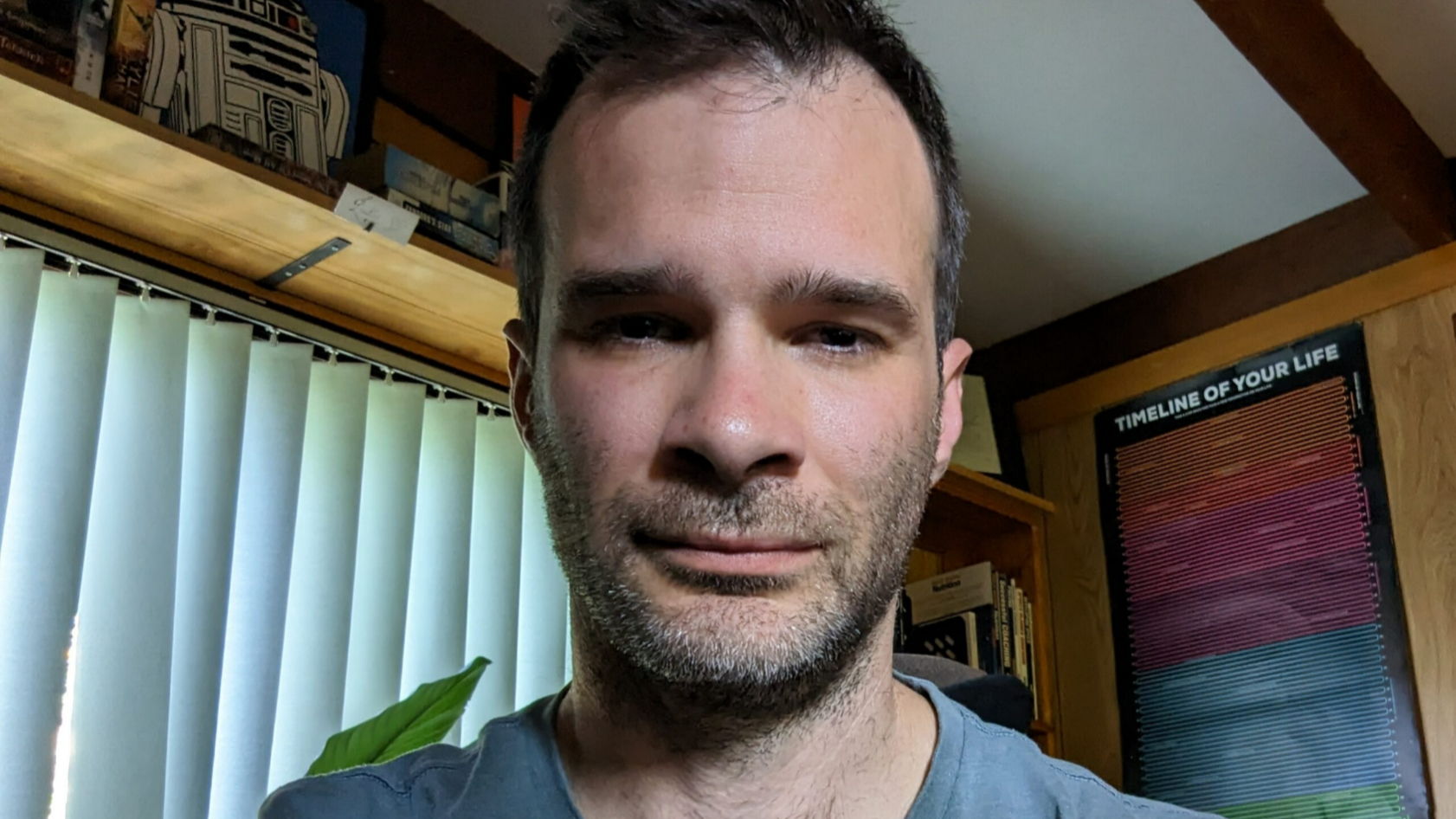 A man with ME/CFS is taking a selfie.